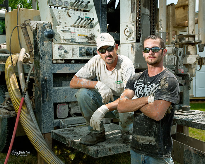Chris and Danny with their drilling rig