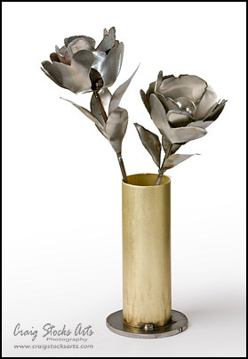 Metal flower in vase