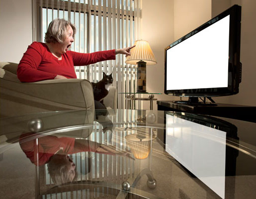 Woman pointing at TV